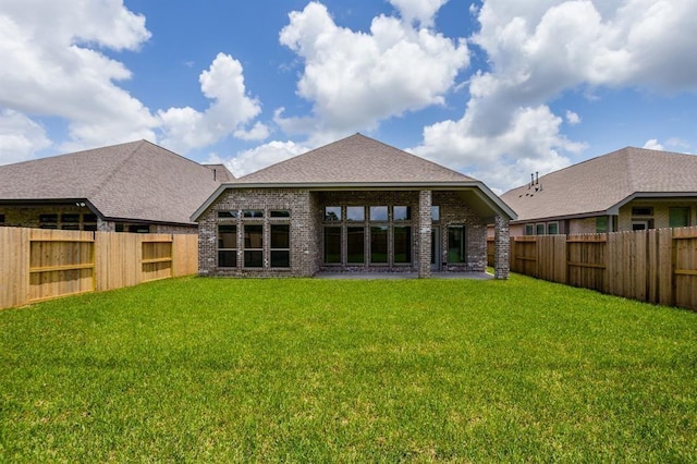 1639 Rosedale Dr, Missouri City, TX 77459 - rear view of property with brick siding and a shingled roof