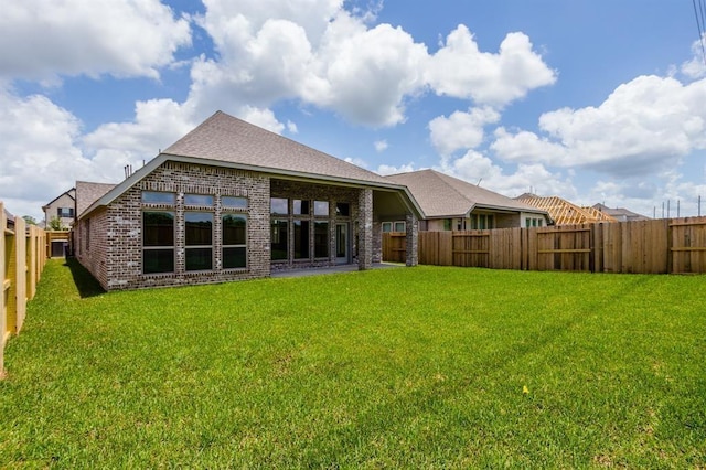 1639 Rosedale Dr, Missouri City, TX 77459 - rear view of property with brick siding and roof with shingles