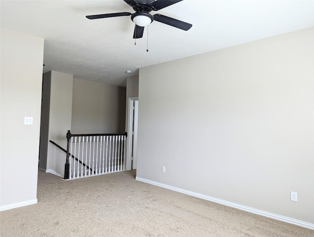 10718 Wall Fern Way, Houston, TX 77034 - carpeted empty room with baseboards and a ceiling fan