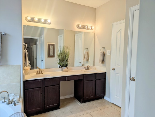 10718 Wall Fern Way, Houston, TX 77034 - bathroom with tile patterned floors, double vanity, and a bath