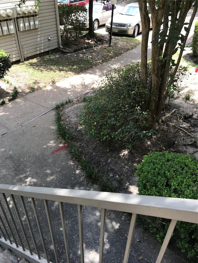 view of yard featuring a balcony