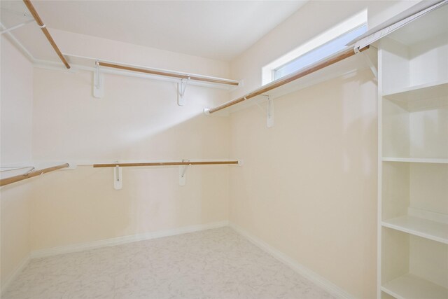 18415 Deer Crossing Dr, Humble, TX 77346 - spacious closet featuring tile patterned floors