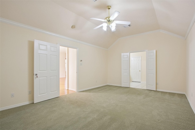 18415 Deer Crossing Dr, Humble, TX 77346 - unfurnished bedroom featuring carpet flooring, vaulted ceiling, baseboards, ornamental molding, and a ceiling fan