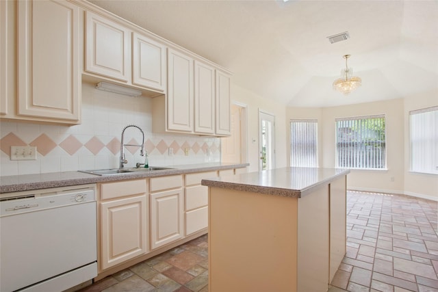 18415 Deer Crossing Dr, Humble, TX 77346 - kitchen featuring dishwasher, a sink, tasteful backsplash, a chandelier, and light countertops