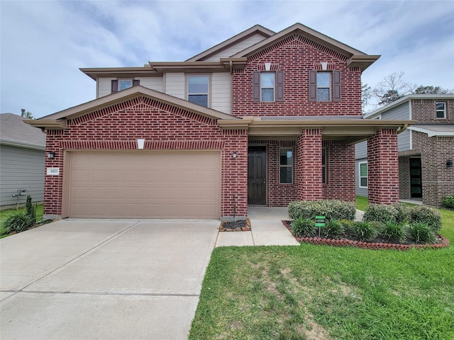 4015 Mossy Banks Ln, Houston, TX 77068 - view of front of home featuring brick siding, concrete driveway, and a garage