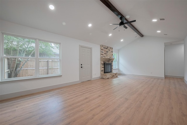 23331 Balthasar St, Spring, TX 77373 - unfurnished living room featuring a fireplace, healthy amount of natural light, ceiling fan, light wood finished floors, and recessed lighting