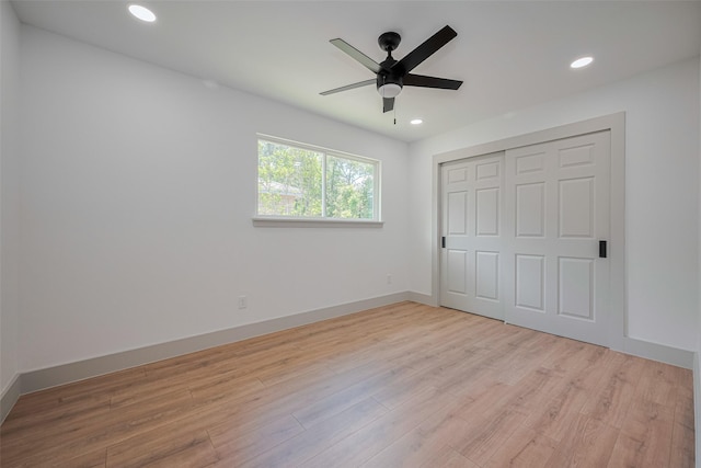 23331 Balthasar St, Spring, TX 77373 - unfurnished bedroom with recessed lighting, light wood-type flooring, a closet, baseboards, and a ceiling fan