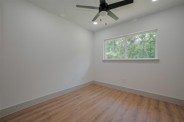 23331 Balthasar St, Spring, TX 77373 - unfurnished room with wood finished floors, recessed lighting, baseboards, and ceiling fan