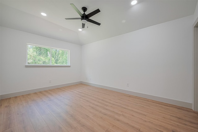 23331 Balthasar St, Spring, TX 77373 - empty room with vaulted ceiling, light wood-style floors, a ceiling fan, recessed lighting, and baseboards