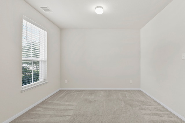 3011 Tandem Ct, Rosenberg, TX 77471 - unfurnished room with plenty of natural light, light colored carpet, and baseboards