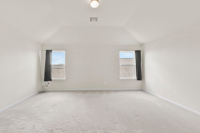 3011 Tandem Ct, Rosenberg, TX 77471 - spare room with lofted ceiling, light colored carpet, and baseboards