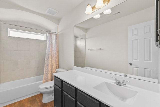 3011 Tandem Ct, Rosenberg, TX 77471 - full bath with toilet, wood finished floors, vanity, and shower / bathtub combination with curtain