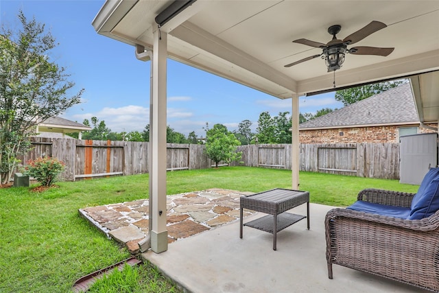 view of patio featuring ceiling fan
