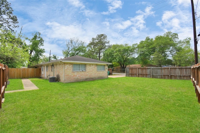 view of yard featuring central AC