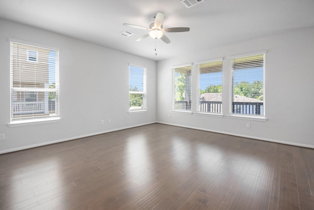 1501 Ashley Ct, Seabrook, TX 77586 - spare room featuring ceiling fan, baseboards, and dark wood-type flooring