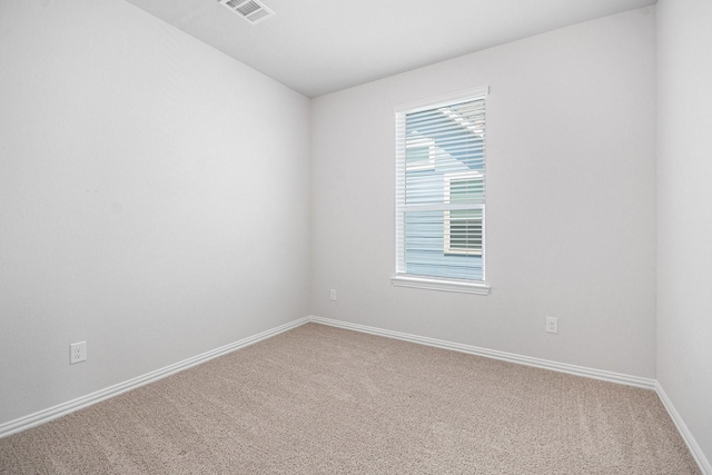1501 Ashley Ct, Seabrook, TX 77586 - carpeted empty room with baseboards