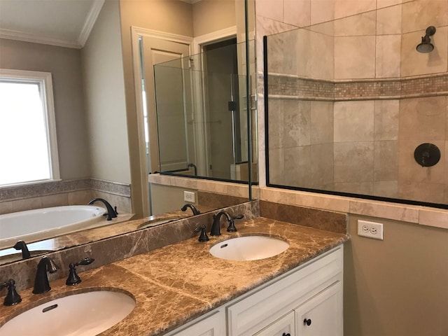 1428 Wichita St, Houston, TX 77004 - full bathroom with double vanity, ornamental molding, a garden tub, and a shower