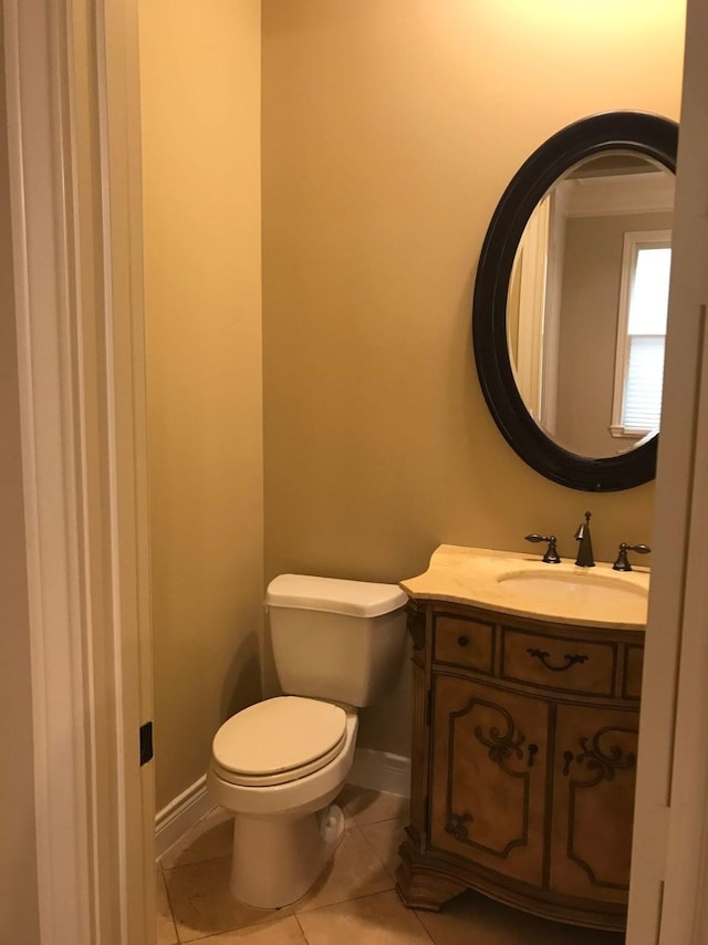 1428 Wichita St, Houston, TX 77004 - half bath featuring toilet, tile patterned flooring, vanity, and baseboards