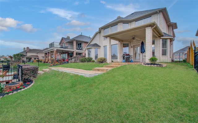 11939 Galentine Pt, Cypress, TX 77429 - rear view of house with a ceiling fan and brick siding