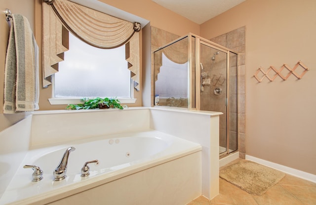 11939 Galentine Pt, Cypress, TX 77429 - full bath featuring a shower stall, a tub with jets, and tile patterned flooring