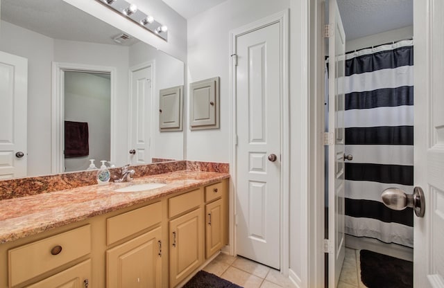11939 Galentine Pt, Cypress, TX 77429 - bathroom with tile patterned flooring, vanity, and curtained shower