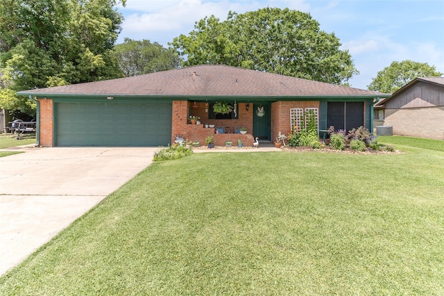 1448 Camellia Dr, Sweeny, TX 77480 - ranch-style house with a garage, brick siding, a front yard, and driveway