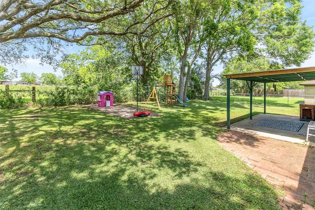 1448 Camellia Dr, Sweeny, TX 77480 - view of yard featuring a playground and a patio