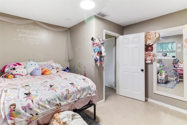 1448 Camellia Dr, Sweeny, TX 77480 - bedroom featuring light tile patterned floors and baseboards