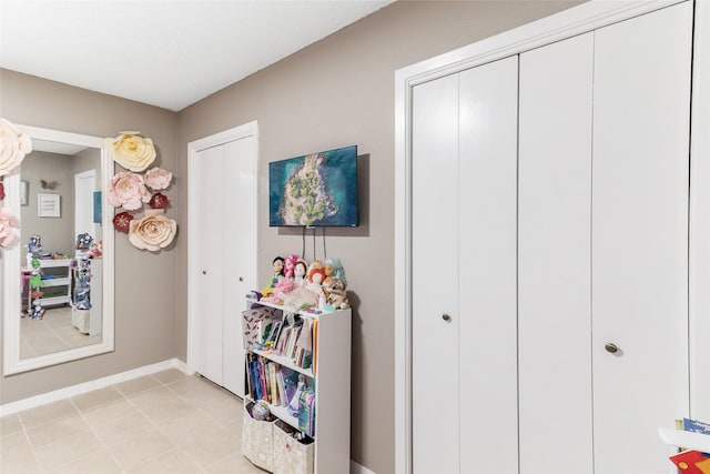 1448 Camellia Dr, Sweeny, TX 77480 - corridor featuring light tile patterned floors and baseboards