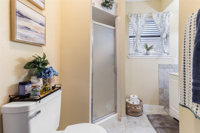 1448 Camellia Dr, Sweeny, TX 77480 - bathroom with toilet, a shower stall, and baseboards