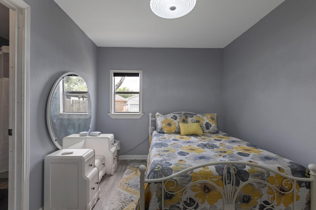 639 Manor St, Houston, TX 77015 - bedroom featuring wood finished floors and baseboards