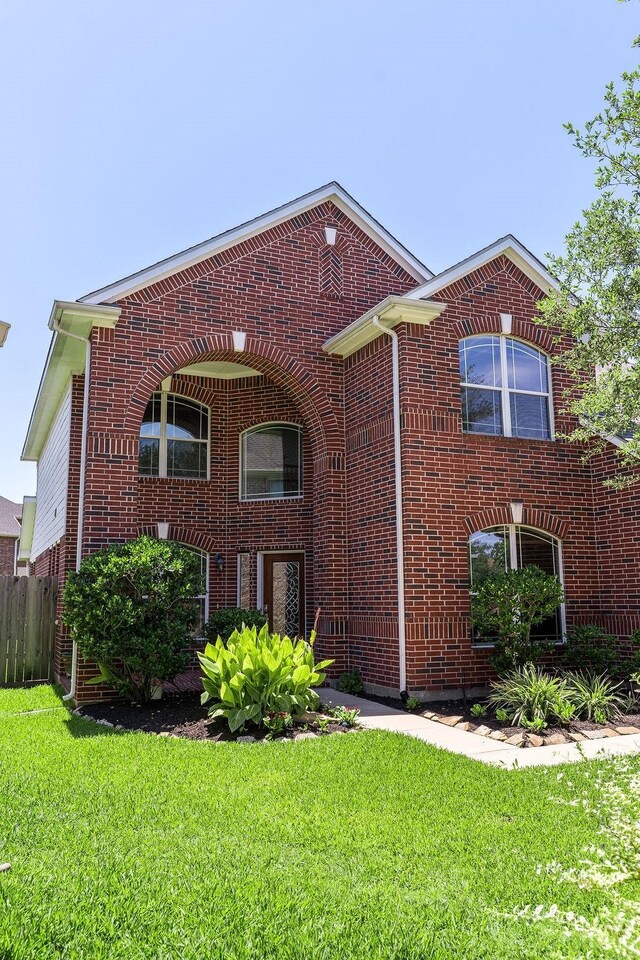 13907 Falling Rain Ct, Cypress, TX 77429 - view of front facade featuring brick siding