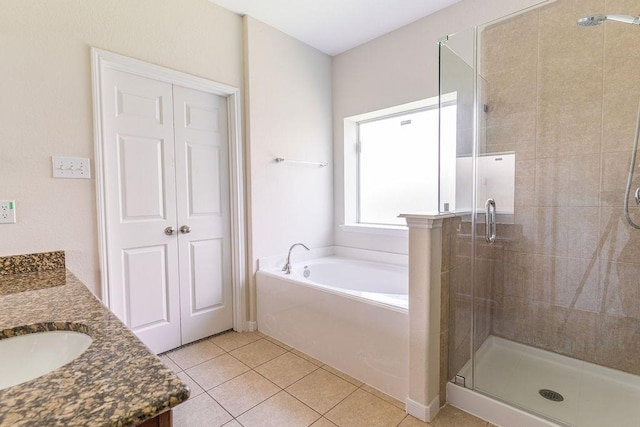 13907 Falling Rain Ct, Cypress, TX 77429 - bathroom featuring a stall shower, a bath, vanity, and tile patterned flooring