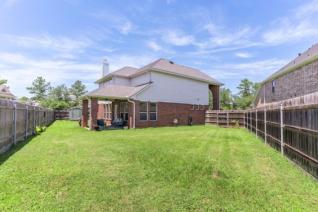 13907 Falling Rain Ct, Cypress, TX 77429 - back of house with a chimney and brick siding