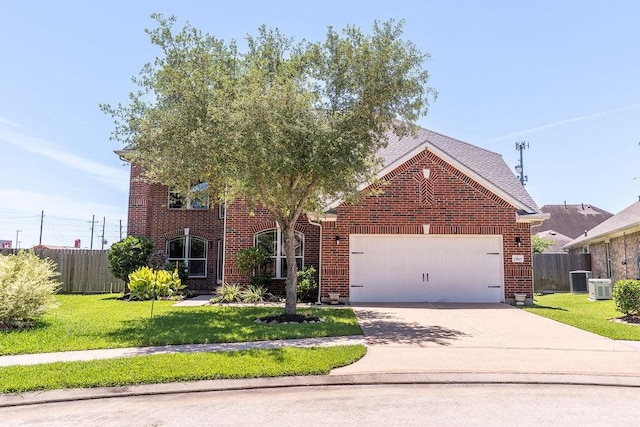 view of front of house featuring a garage, driveway, brick siding, and central AC