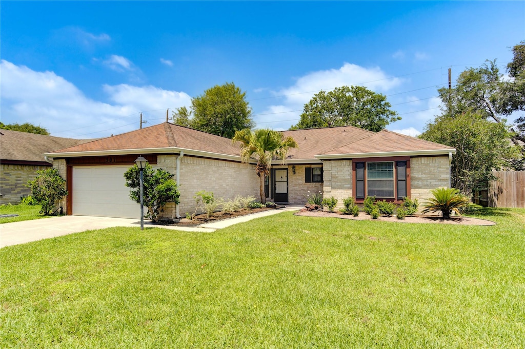 507 Rolling Mill Dr, Sugar Land, TX 77498 - ranch-style house with an attached garage, driveway, a shingled roof, and brick siding