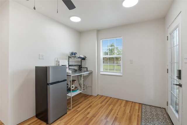 1619 Fm 517th Rd E, San Leon, TX 77539 - home office featuring light wood-type flooring and a ceiling fan