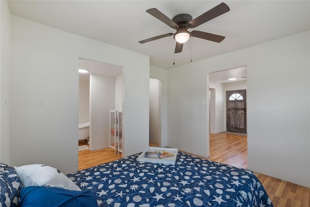 1619 Fm 517th Rd E, San Leon, TX 77539 - bedroom featuring light wood-style floors and ceiling fan