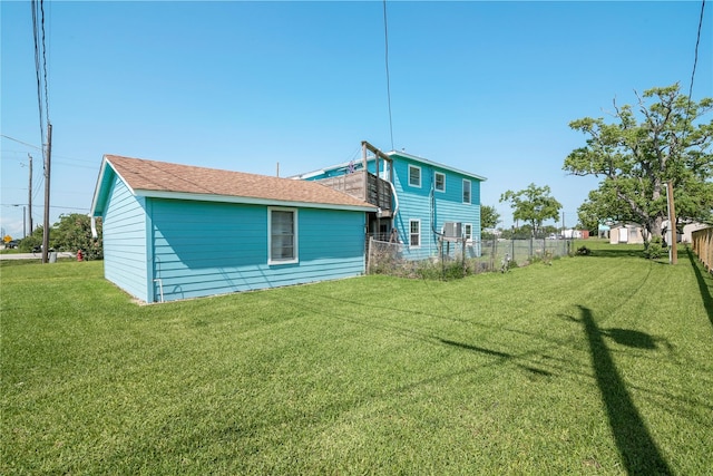 1619 Fm 517th Rd E, San Leon, TX 77539 - rear view of house featuring roof with shingles