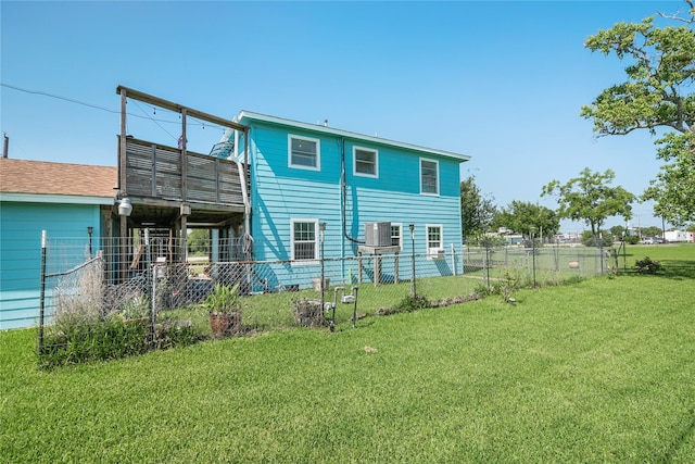 1619 Fm 517th Rd E, San Leon, TX 77539 - rear view of house with a cooling unit and a wooden deck
