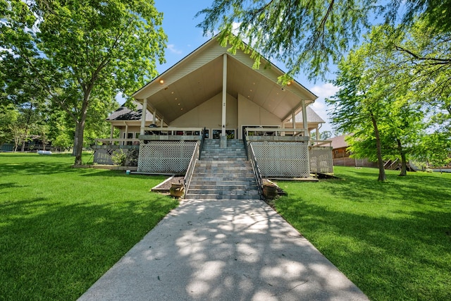 180 Hummel Ln, Coldspring, TX 77331 - view of front of home with a front lawn and stairs