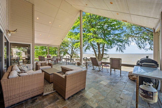 180 Hummel Ln, Coldspring, TX 77331 - view of patio / terrace with outdoor lounge area and a water view