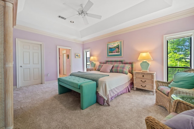 180 Hummel Ln, Coldspring, TX 77331 - carpeted bedroom with crown molding, a raised ceiling, and ceiling fan