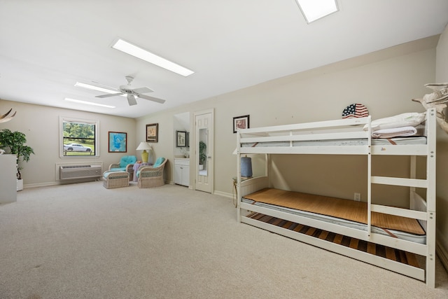 180 Hummel Ln, Coldspring, TX 77331 - unfurnished bedroom with a skylight, carpet, baseboards, and a ceiling fan
