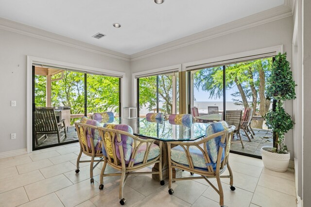 180 Hummel Ln, Coldspring, TX 77331 - dining space with plenty of natural light, crown molding, light tile patterned floors, baseboards, and recessed lighting