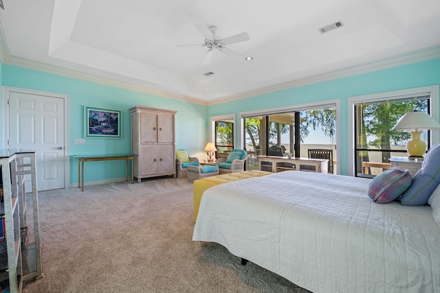 180 Hummel Ln, Coldspring, TX 77331 - bedroom with crown molding, a raised ceiling, carpet floors, a ceiling fan, and baseboards