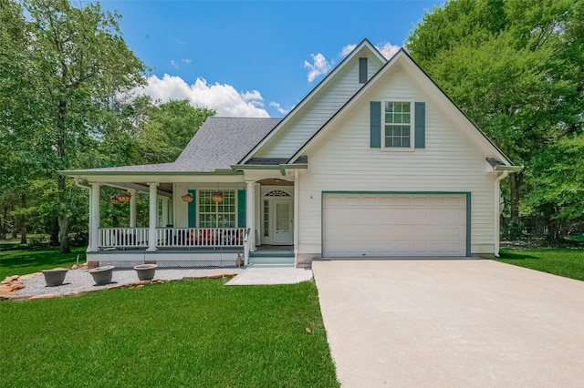 8946 Catamaran Way, Montgomery, TX 77316 - view of front of property with a porch, driveway, a front yard, and a shingled roof