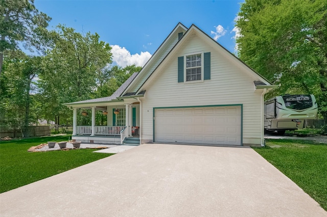 8946 Catamaran Way, Montgomery, TX 77316 - view of front of house featuring a porch, driveway, and a garage