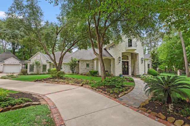 3706 Skyoak Ct, Spring, TX 77386 - view of front facade featuring brick siding and a front lawn