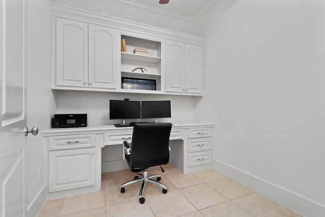 3706 Skyoak Ct, Spring, TX 77386 - office area with built in desk, ornamental molding, light tile patterned floors, and baseboards